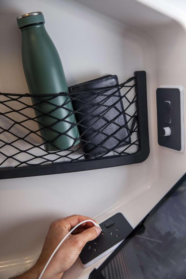 Lylo Auckland Hotel 외부 사진 A wallet and a mobile phone in a train pocket